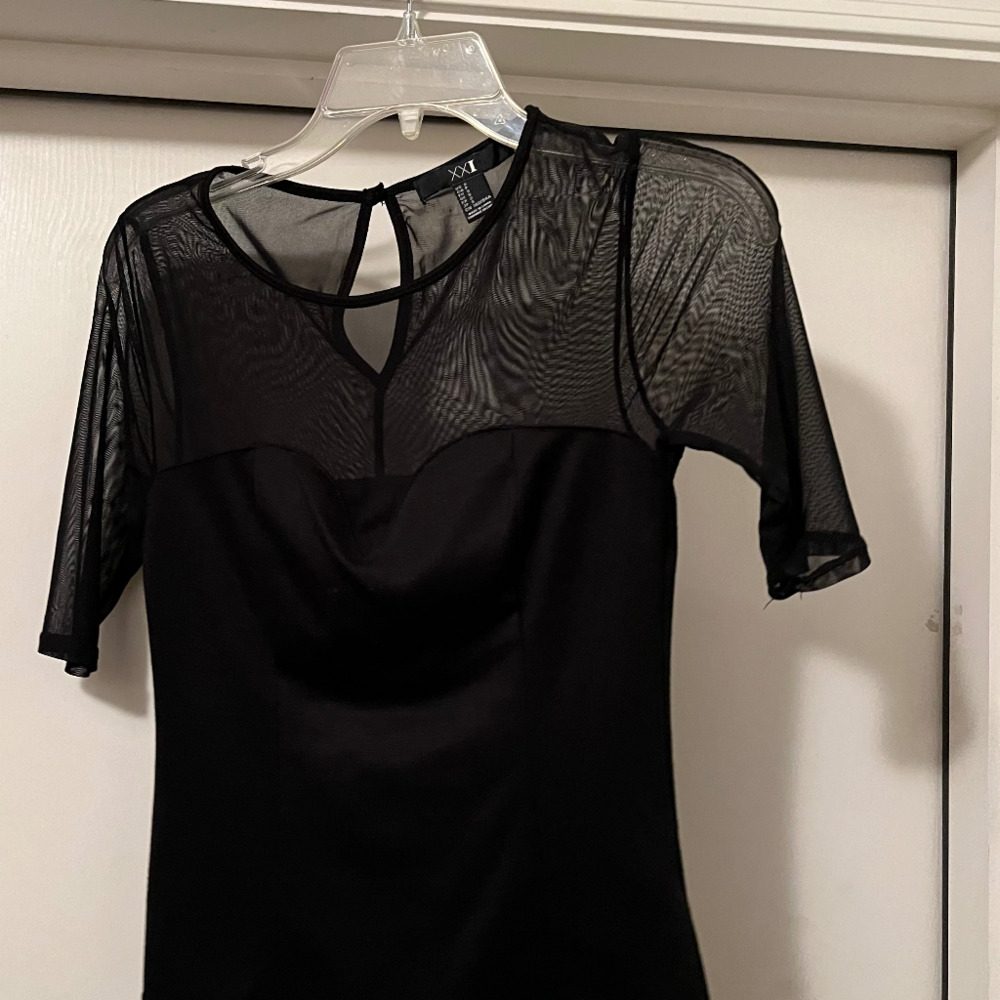 Forever 21 black heartline meshed top size S